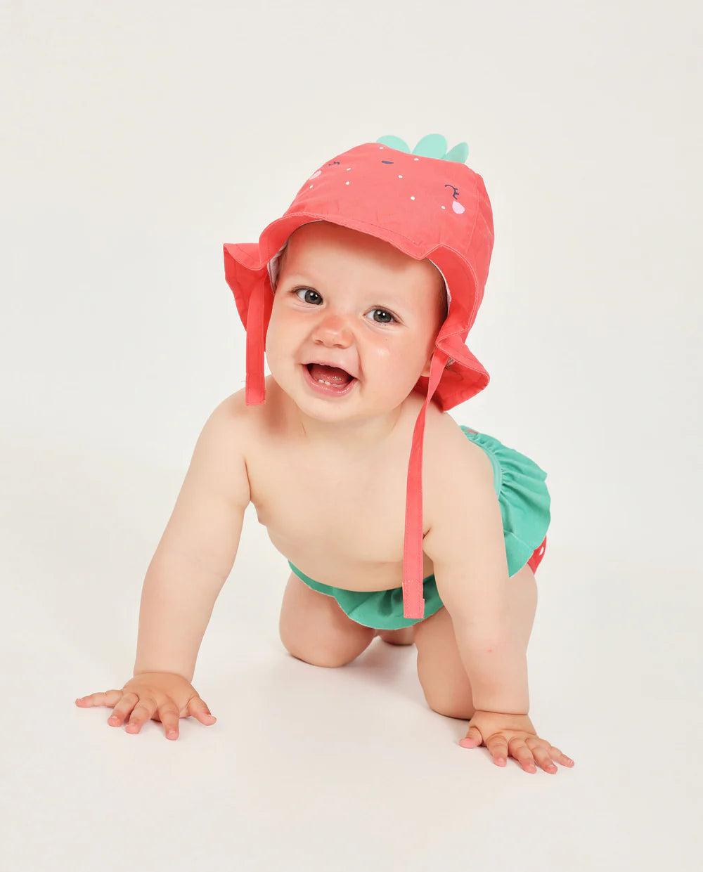 Completino da bagno per neonata con cappellino protettivo UPF 50+